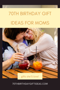70th Birthday Gift Ideas for Moms - Gifts She'll Love - Mom and daughter embracing as they drink  cocktails 